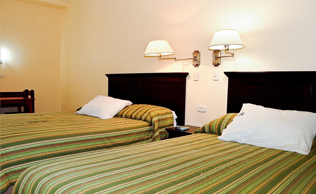 Hotel Presidente Selva La Merced  Camera foto